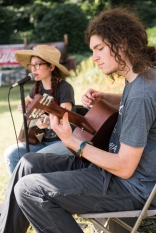 Musicians Kayla Zuskin and Stephen Horvath play together as Fort in the Sky during the weekly River Arts District Farmers Market.